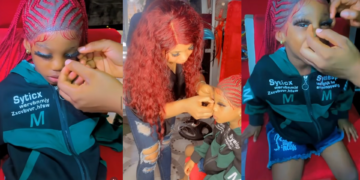 Nigerian lady shared adorable video of her Little Daughter fixing eyelashes, longnails and getting Glammed up!