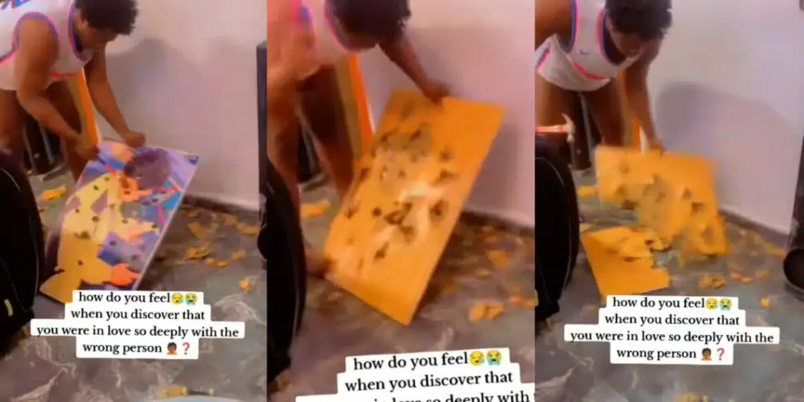 Man Destroys Frame Girlfriend Got For Him After She Broke Up With Him (Video)