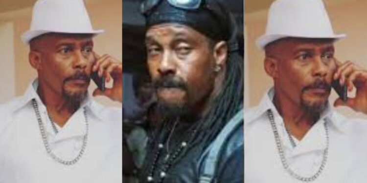 Hanks Anuku cries out for help as he  storm the street with a protest 