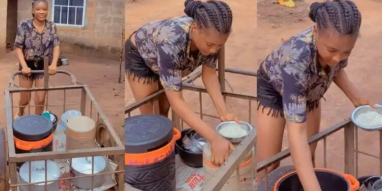Pretty Nigerian lady stir reactions as she help her mum to sell food on bum shorts 