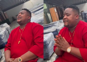 “Billionaire Dey Take Economy Class?”- Netizens React As Cubana Chief Priest Was Spotted Taking Economic Class