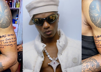 Nigerian Man Tattooed Wizkid’s Full Biography on His Body as a Birthday Gift