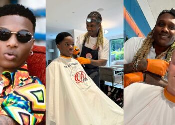 Wizkid’s Son, Boluwatife Spotted Getting His Hair Done From A UK Barber Who Charges N5M Per Hair 