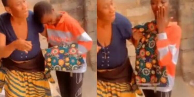 TRUE LOVE STILL EXISTS! Nigerians react as landlady gifts a lady wrapper