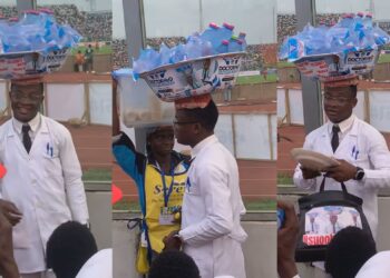 A viral video of a medical student spotted in his lab coat selling bottled and sachet water to further his education.