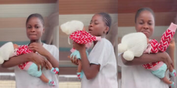 “My sister died two days after giving birth to her daughter and her spirit will keep protecting her gift from my sister to me” lady says as she shares a video of her self carrying her late sister baby.