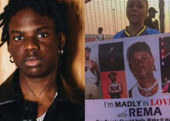 “I’m Man,dly in Lov with REMA You People Should help Make It HAPPEN” Woman’s goes Viral as she took to street, Carrying Rema Banner to proves her true love for the Nigeria singer