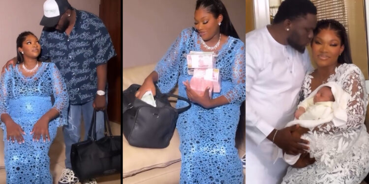 Man celebrates his wife with bag of millions of naira just for the stress she went through labour as they welcome their first child. 