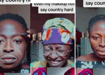Lady raised eyebrows, as she L Stuns Social Media by Transforming Her Face into Tinubu’s with Makeup