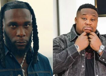 “If to say Diddy dey outside, dem for use johnson baby oil rub her Grammy away” – Cubana Chiefpriest throws shade at Burna Boy after Grammy loss