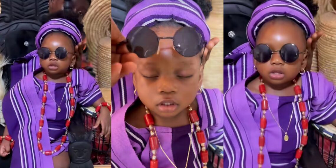 “She go get natural talent for acting”- 1-year-old girl falls asleep during birthday photoshoot, steals hearts with her Aso-oke outfit